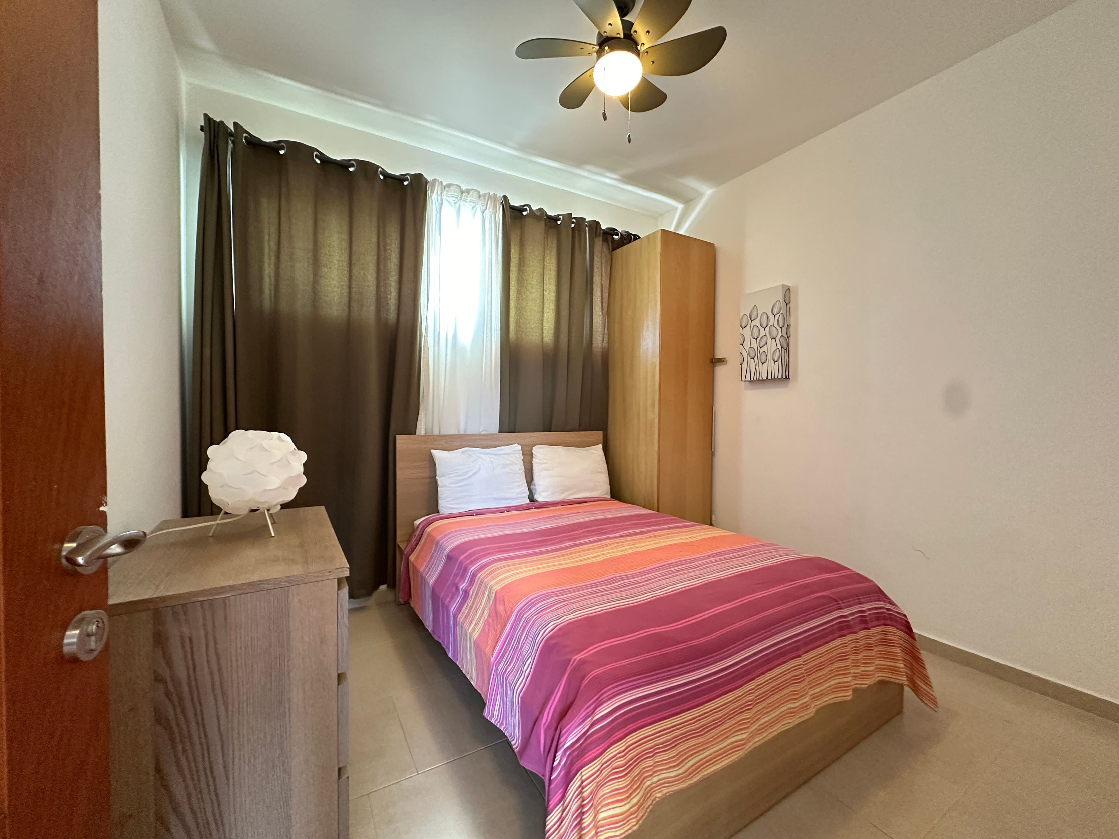 2-Bedroom Furnished Condo in Beachfront Infiniti Blu, Sosúa — Bedroom