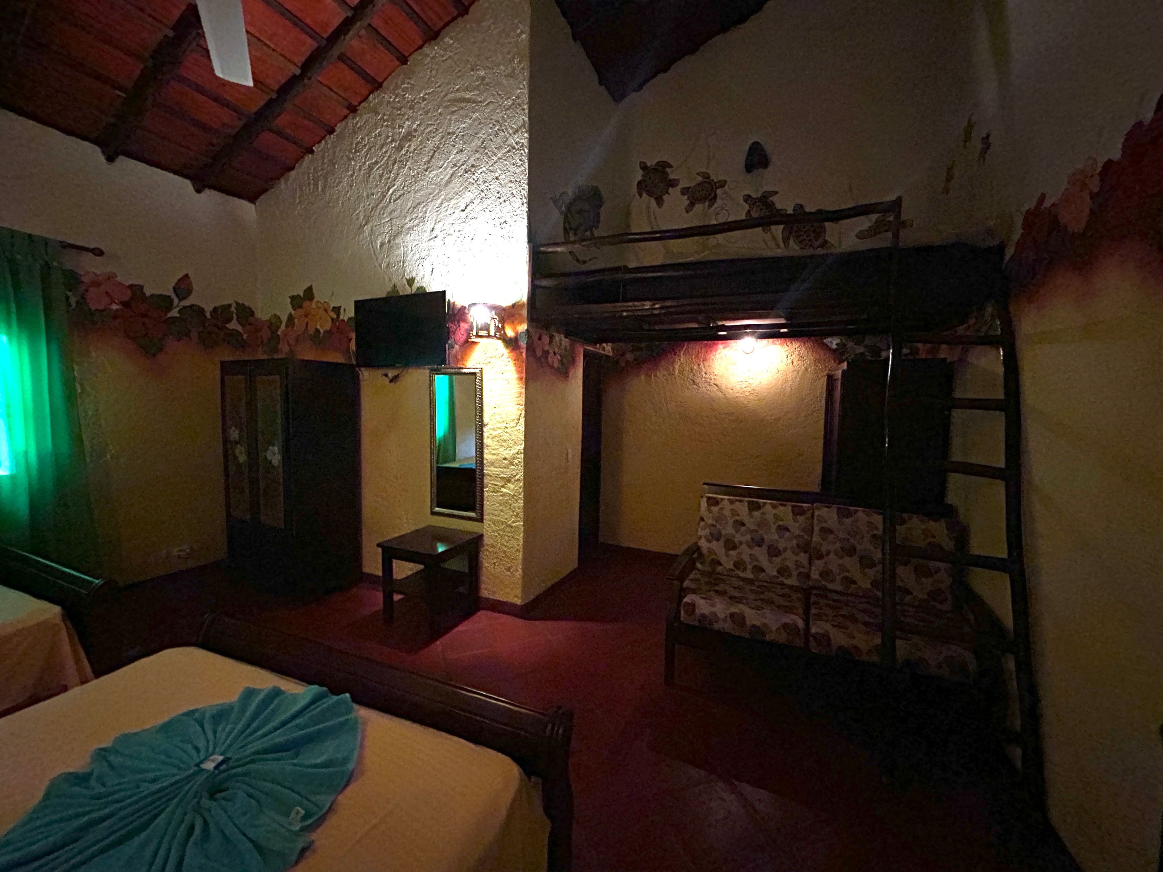 21-Room Mexican-Style Hotel with Courtyard Pool in Sosúa — Guest room