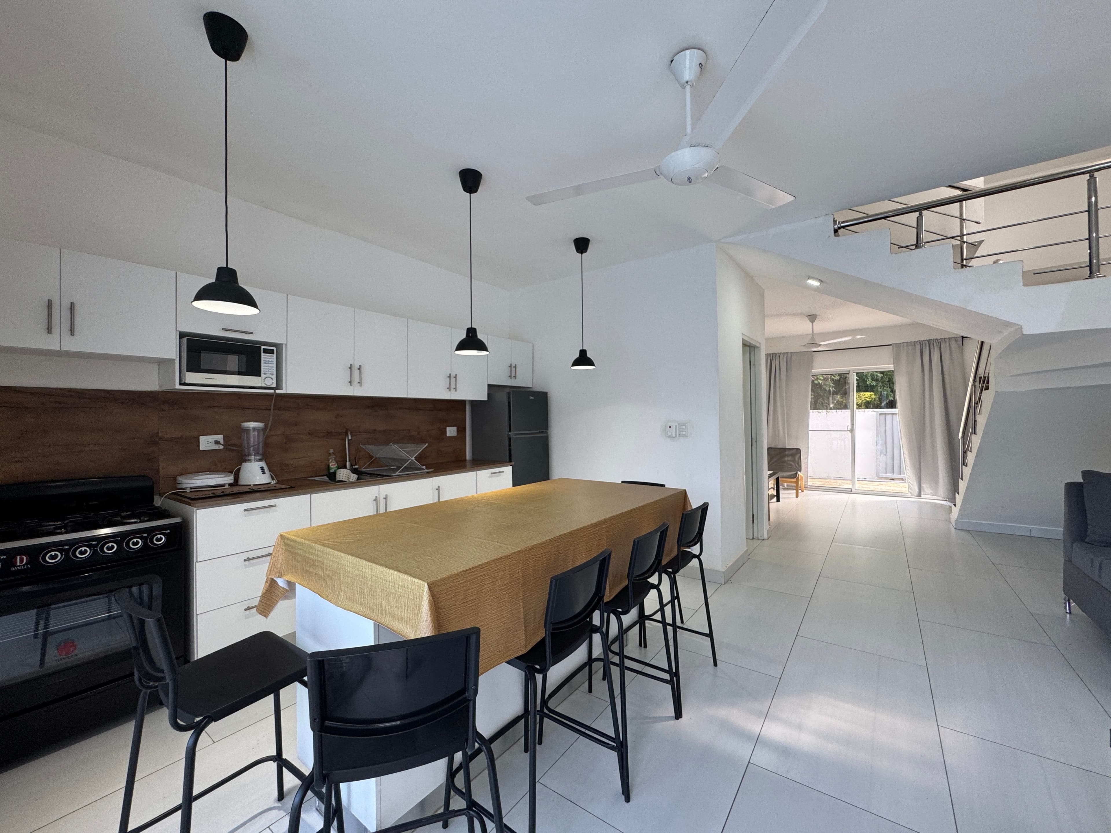3-Bedroom Townhome with Private Pool in Central Sosúa — Open living & dining area