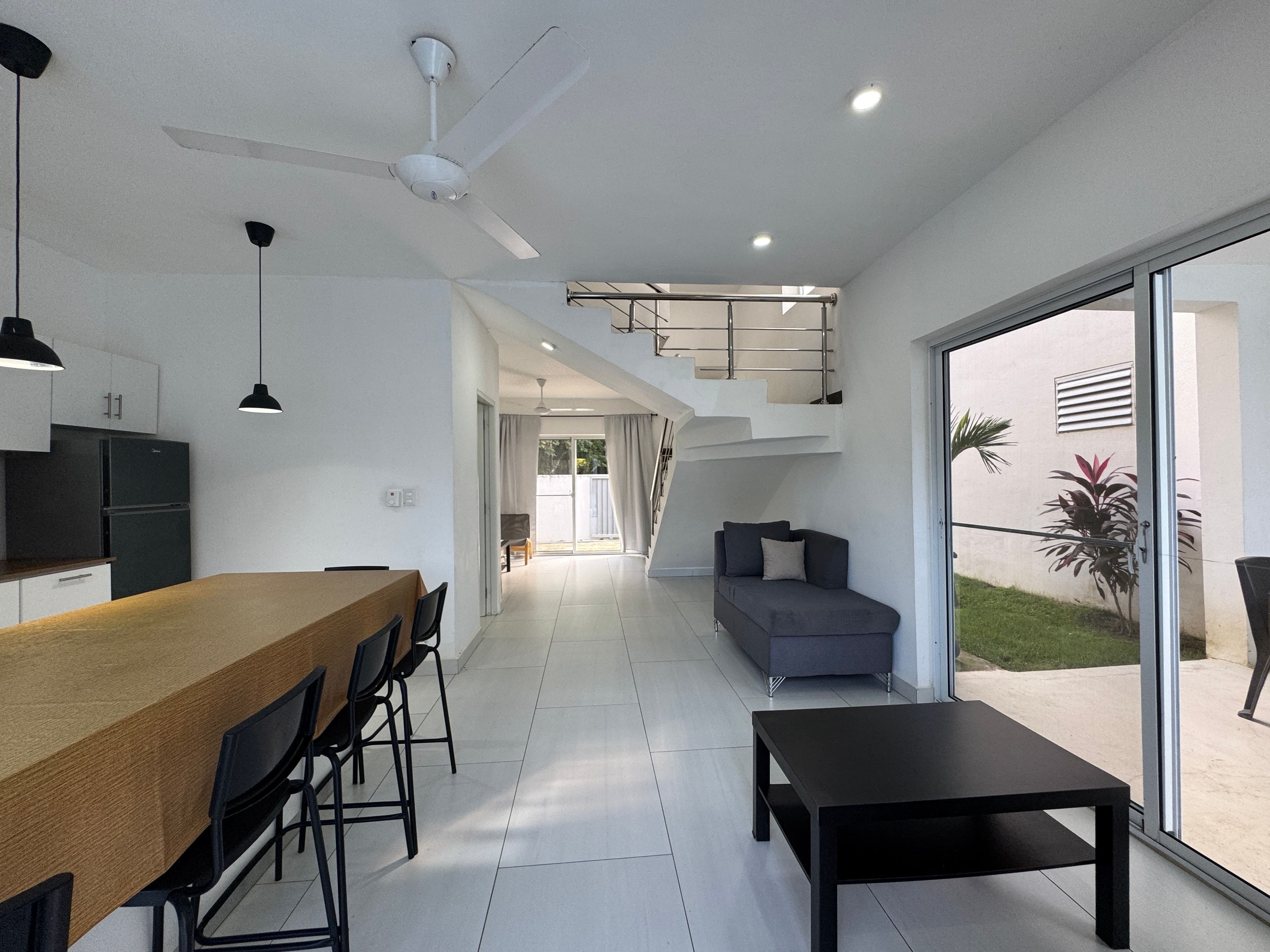 3-Bedroom Townhome with Private Pool in Central Sosúa — Open living & dining area