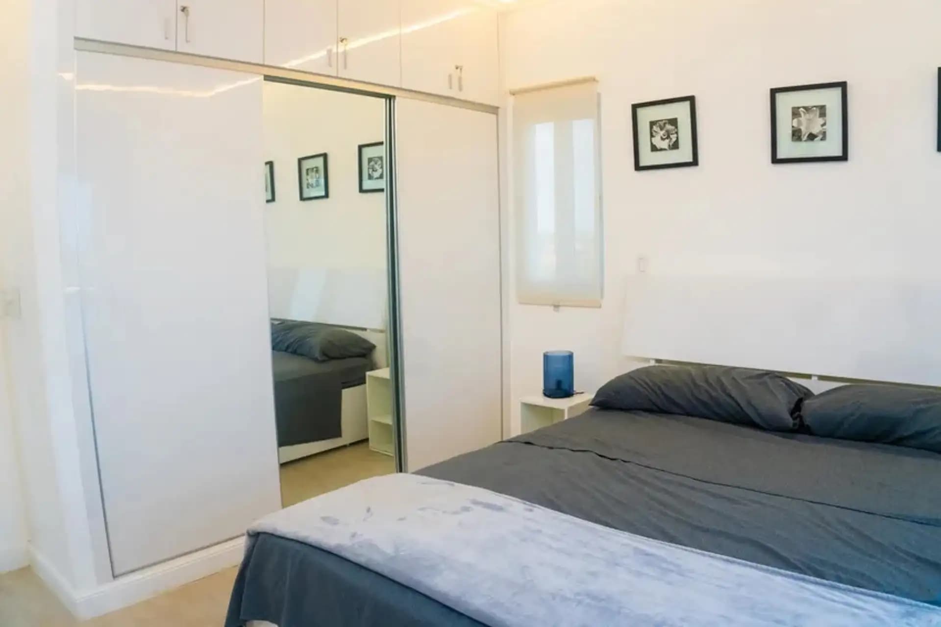 1-Bedroom Furnished Apartment with Ocean View Balcony in Sosúa — Bedroom