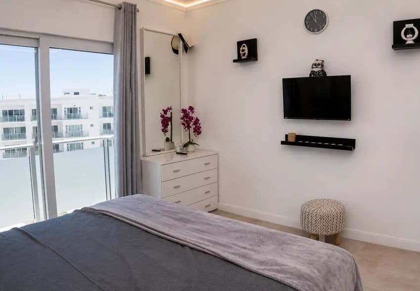 1-Bedroom Furnished Apartment with Ocean View Balcony in Sosúa — Bedroom