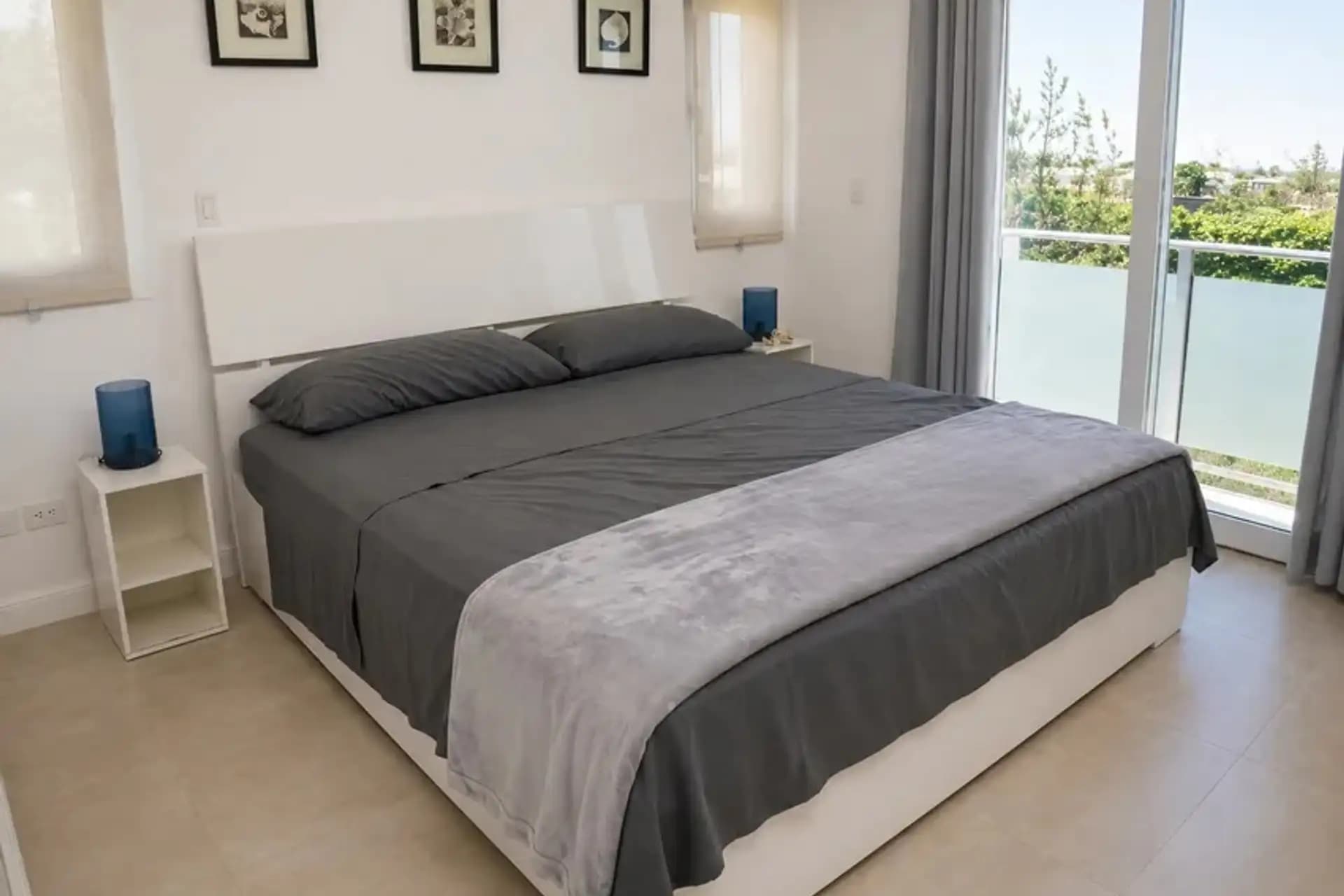1-Bedroom Furnished Apartment with Ocean View Balcony in Sosúa — Bedroom