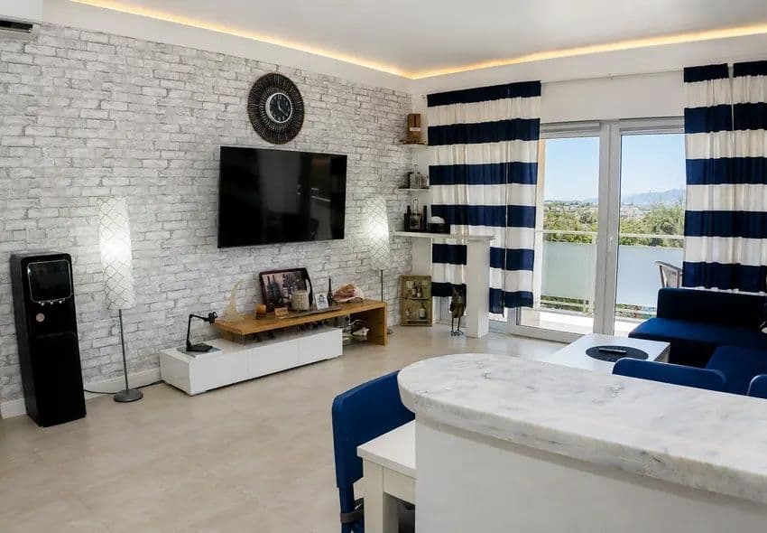 1-Bedroom Furnished Apartment with Ocean View Balcony in Sosúa — Living room