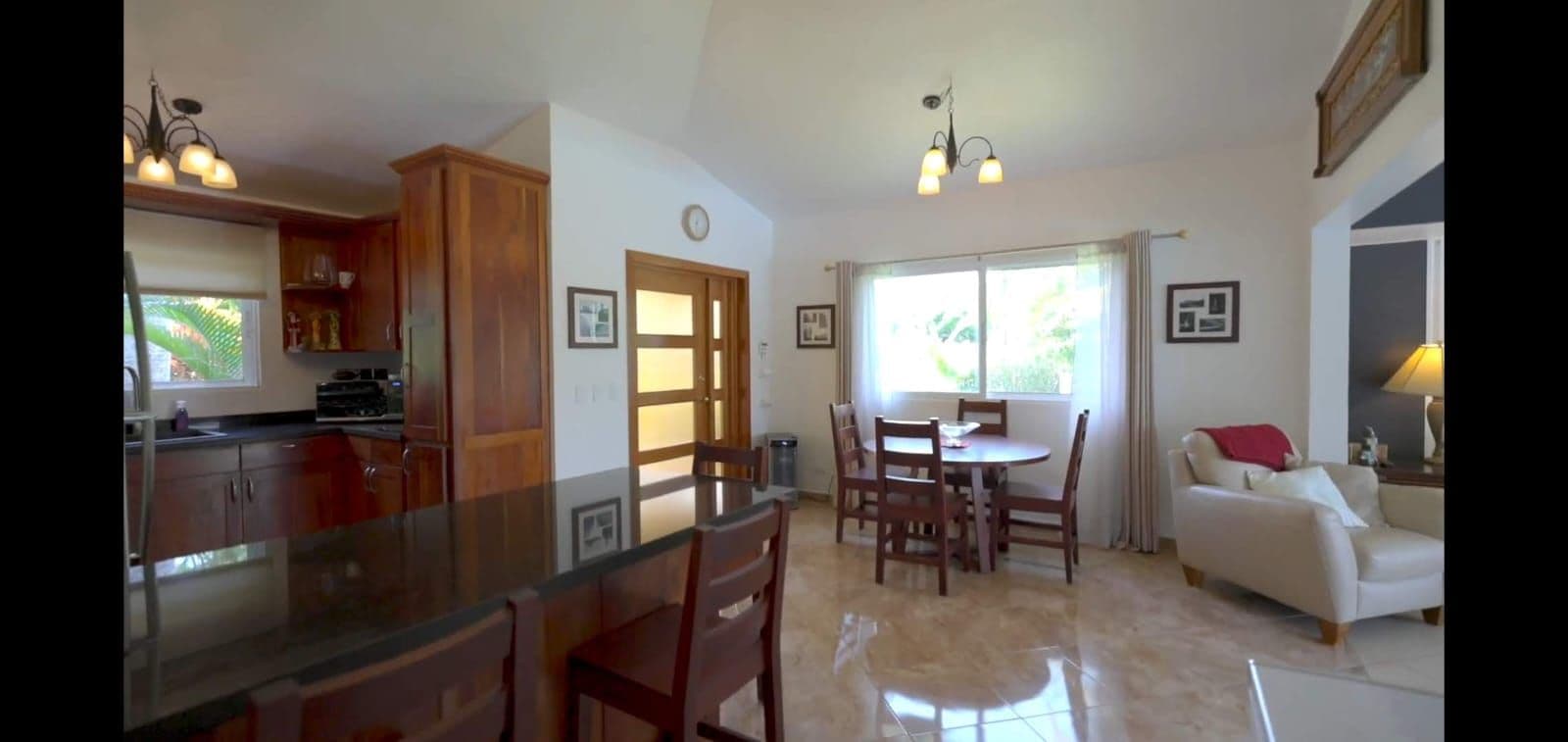 2-Bedroom Villa with Pool and Large Garden in Casa Linda, Sosúa — Open living & dining area