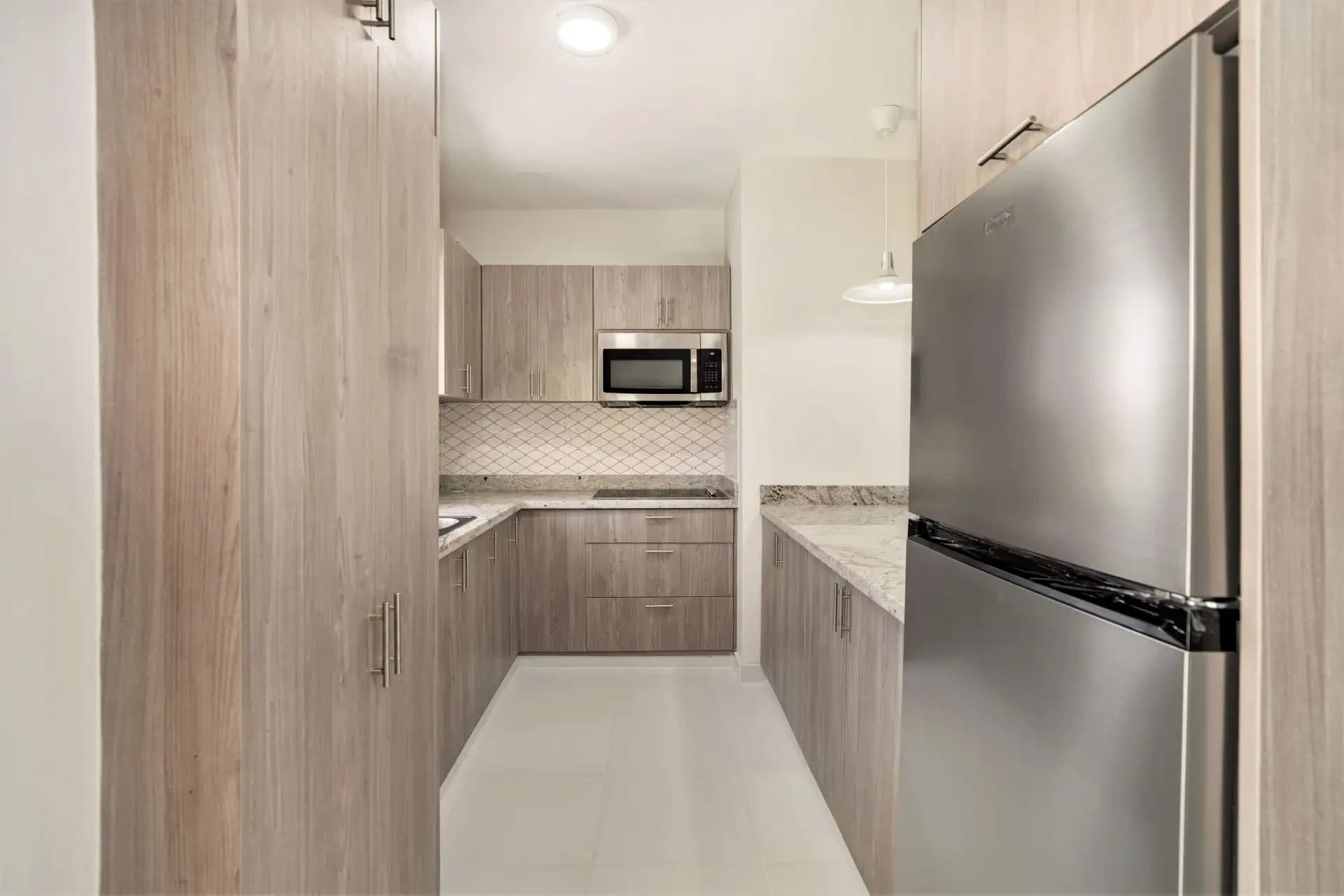 شقة من غرفتي نوم في الطابق الأرضي في Hispaniola Hill Side Condos، Sosúa — Kitchen