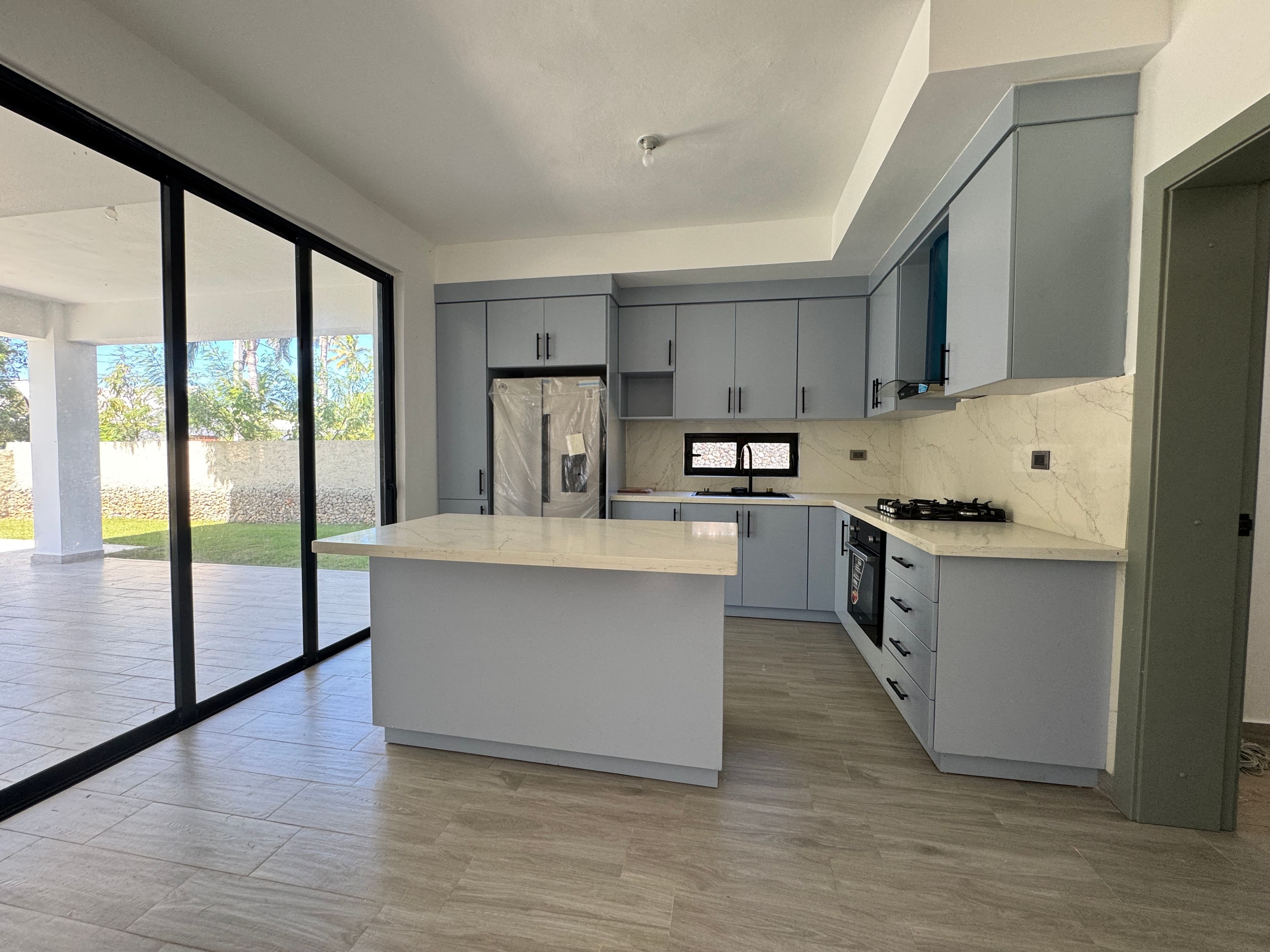 Modern 3-Bedroom Pool Villa in Villas Larimar, Perla Marina — Kitchen