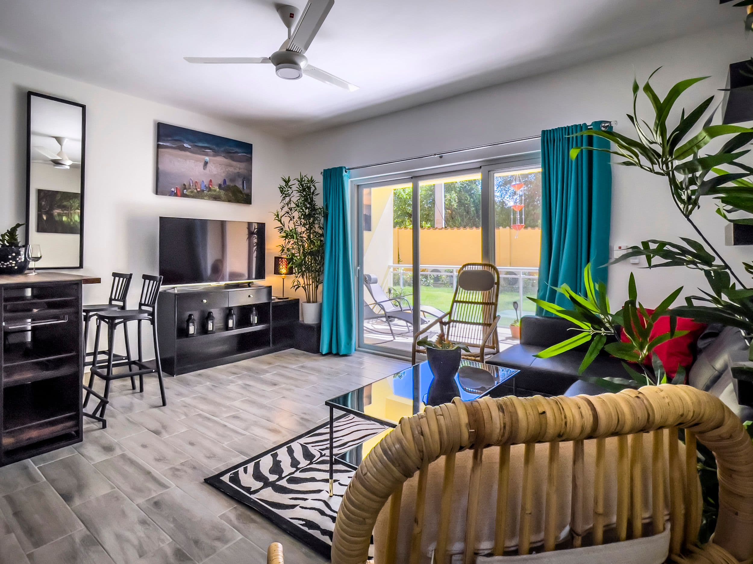 1-Bedroom Furnished Condo near Sosúa Beach in Hill Side Condos — Living room