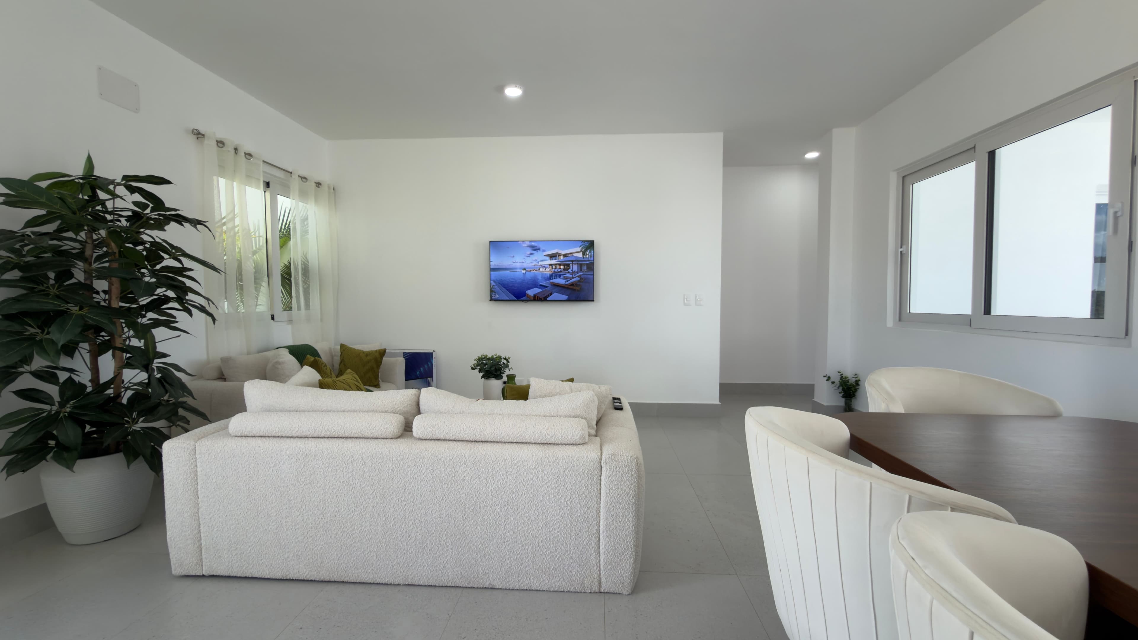 3-Bedroom Furnished Villa with Private Pool in Sosúa Ocean Village — Open living & dining area