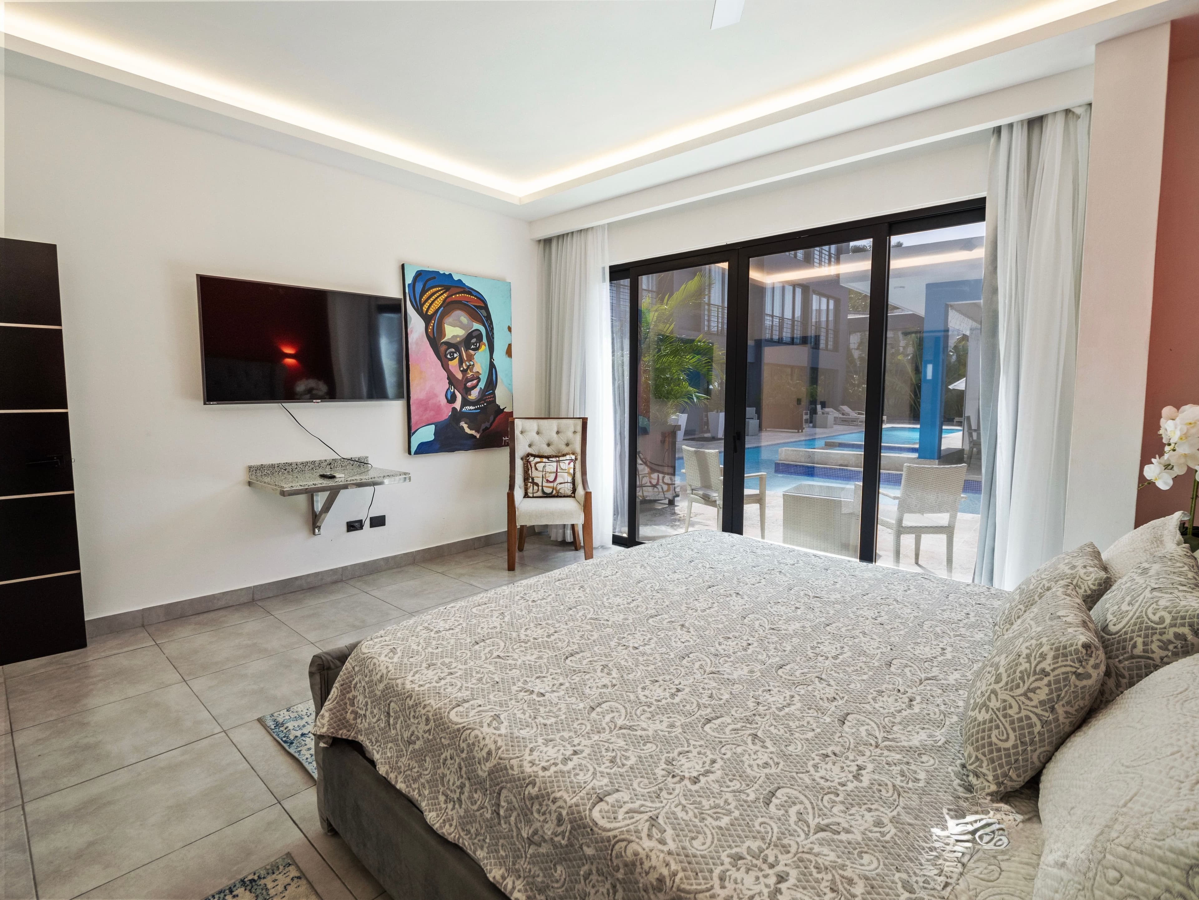 1-Bedroom Deluxe Rental Apartment with Pool and Gym in Sosúa — Bedroom