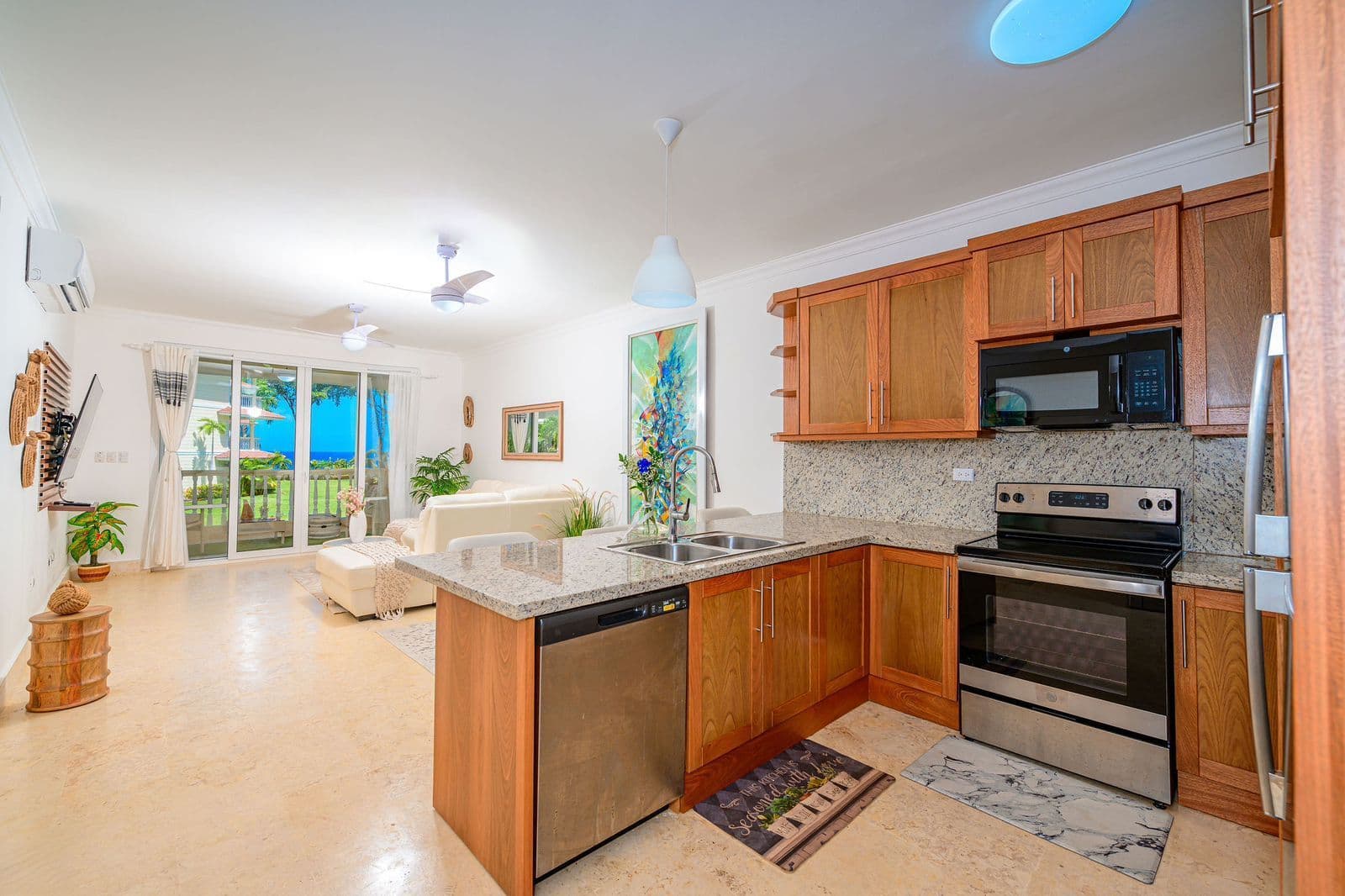 2-Bedroom Ocean-View Apartment at Hispaniola Beach, Sosúa — Open living & dining area