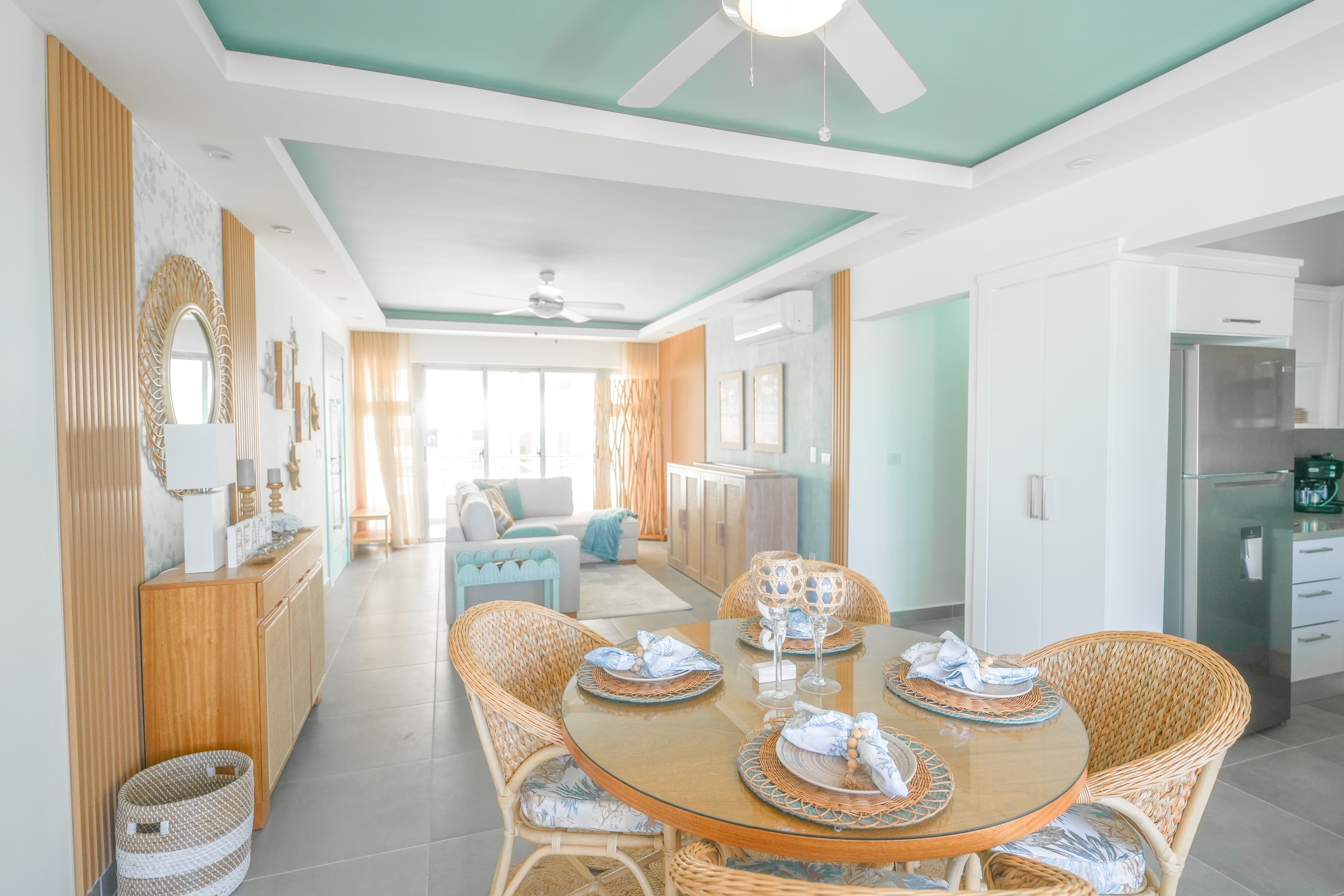 3-Bedroom Condo with Resort Amenities near Encuentro Beach, Cabarete — Open living & dining area