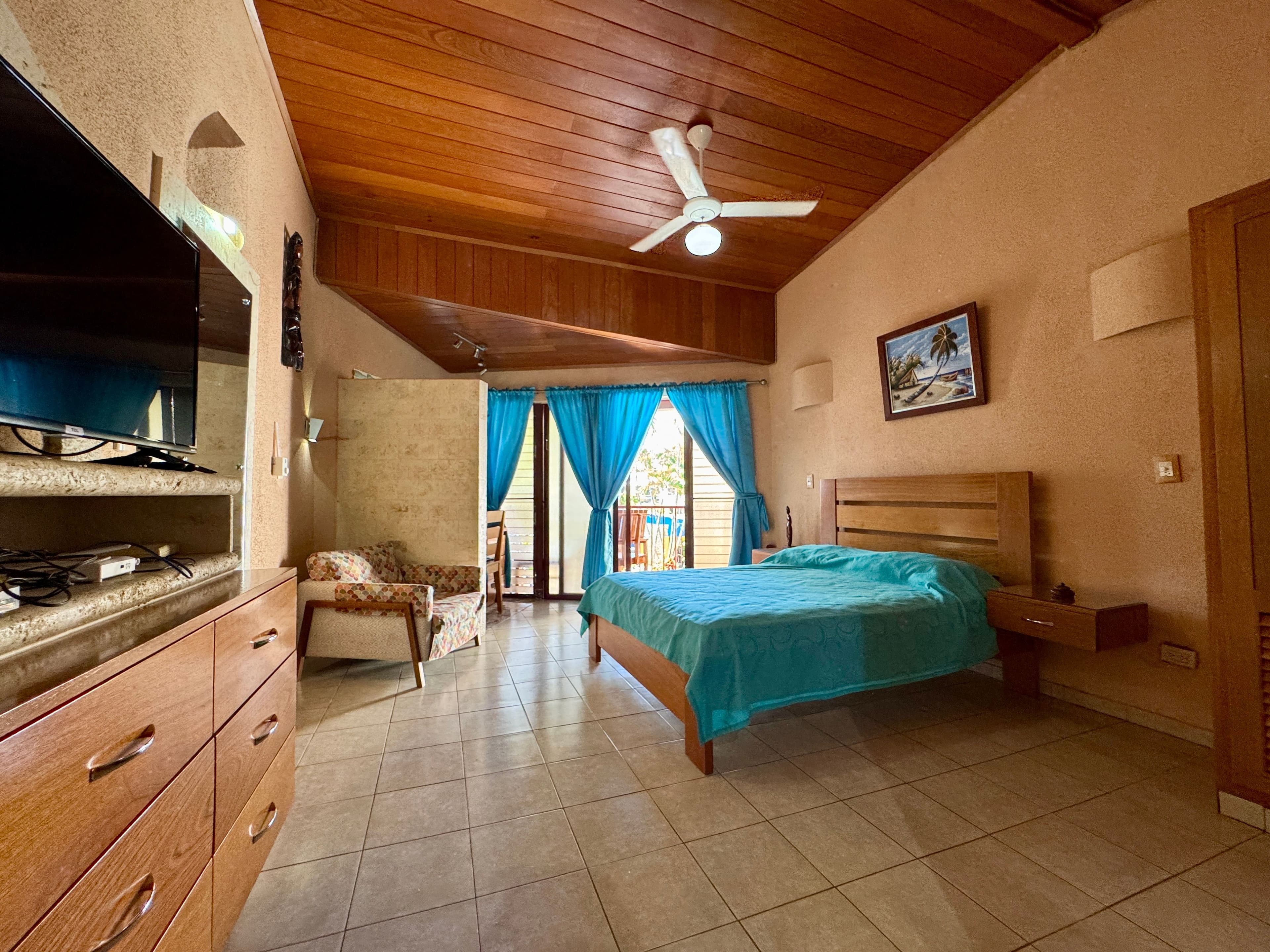 Studio de standing avec finitions en chêne brésilien et vue piscine à Sosúa — Bedroom
