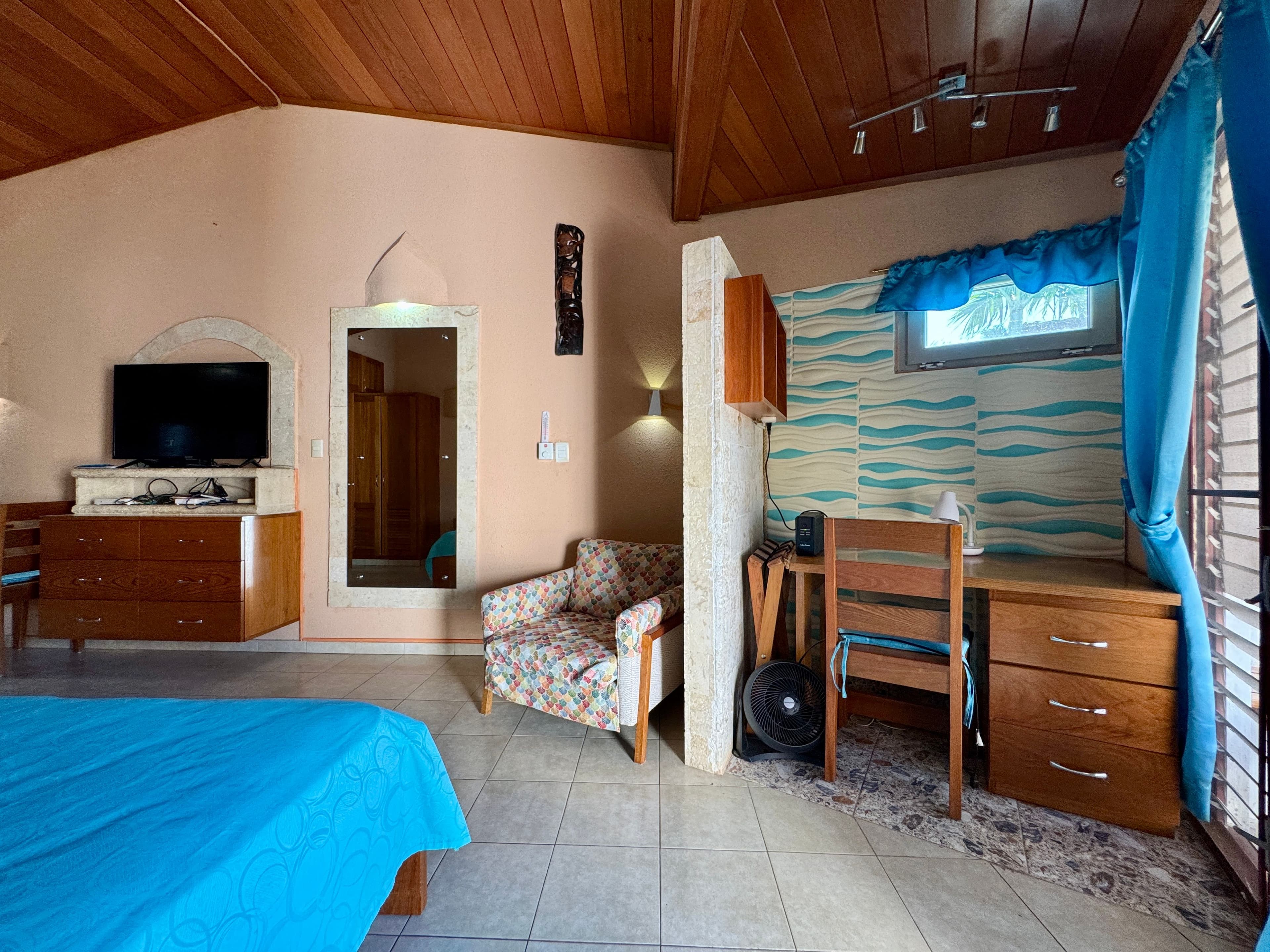 Studio de standing avec finitions en chêne brésilien et vue piscine à Sosúa — Bedroom
