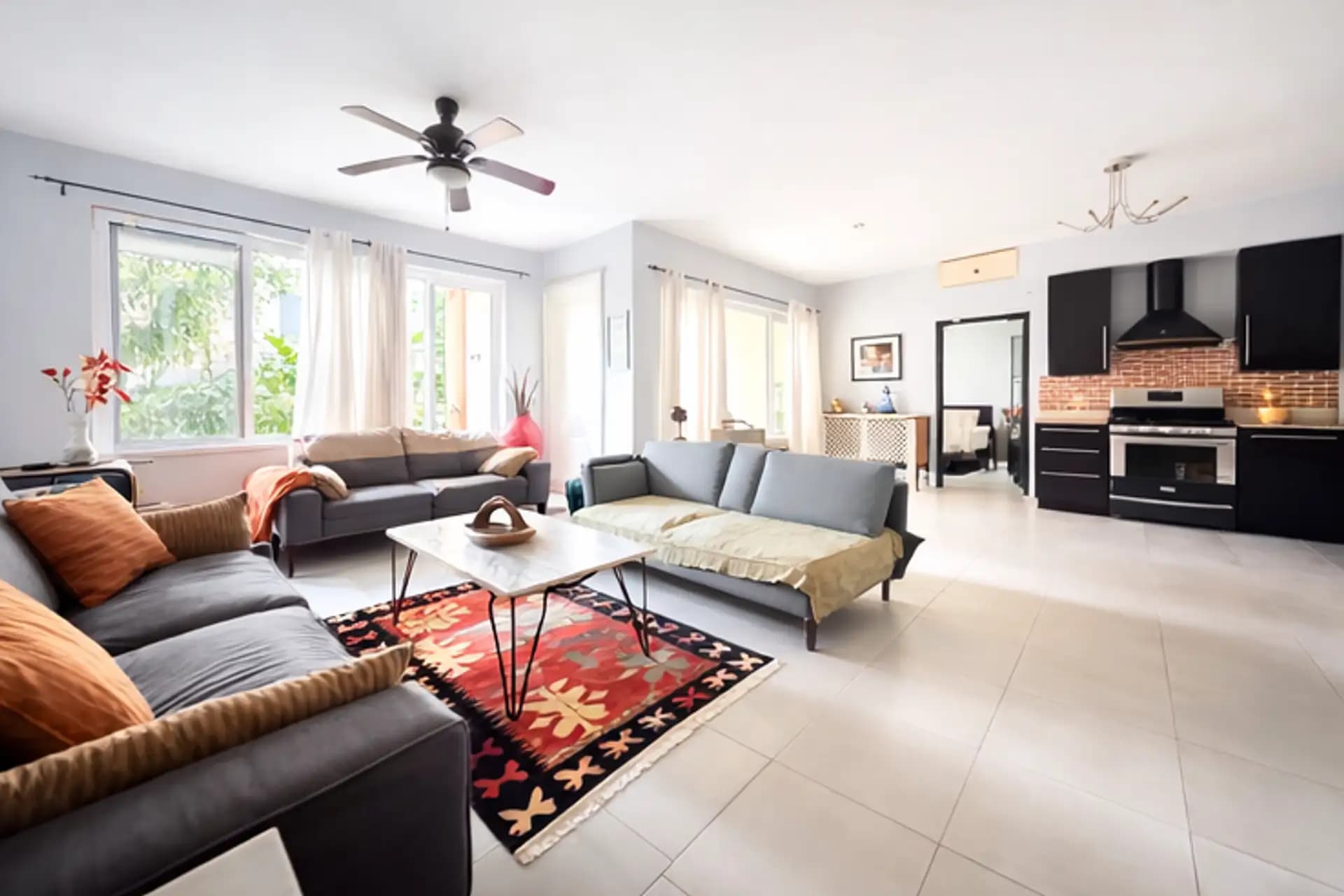 1-Bedroom Ocean View Condo with Balcony in Infiniti Blu, Sosúa — Open living & dining area