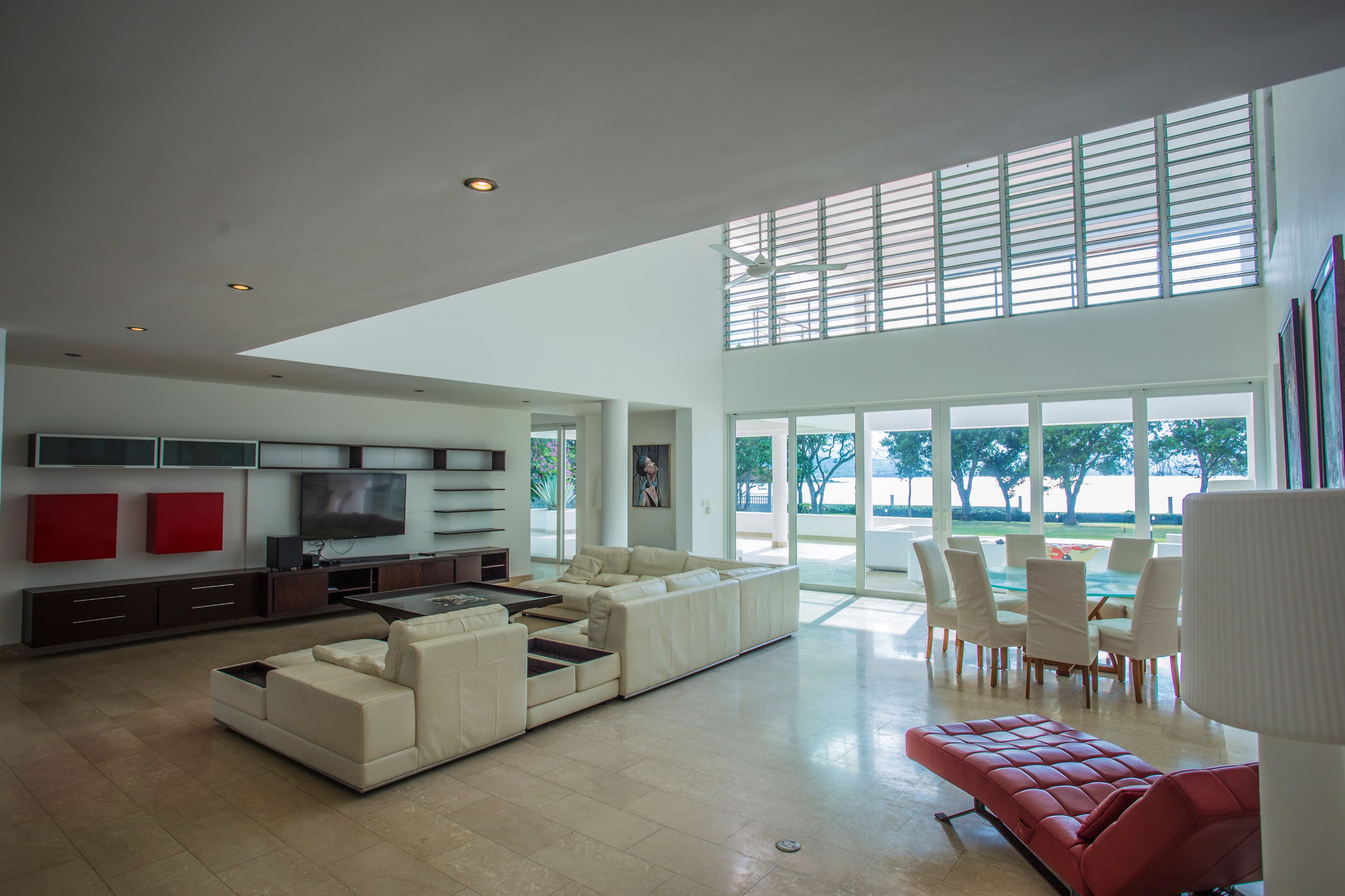 6-Bedroom Oceanfront Estate with Private Beach Access in Sosúa — Open living & dining area