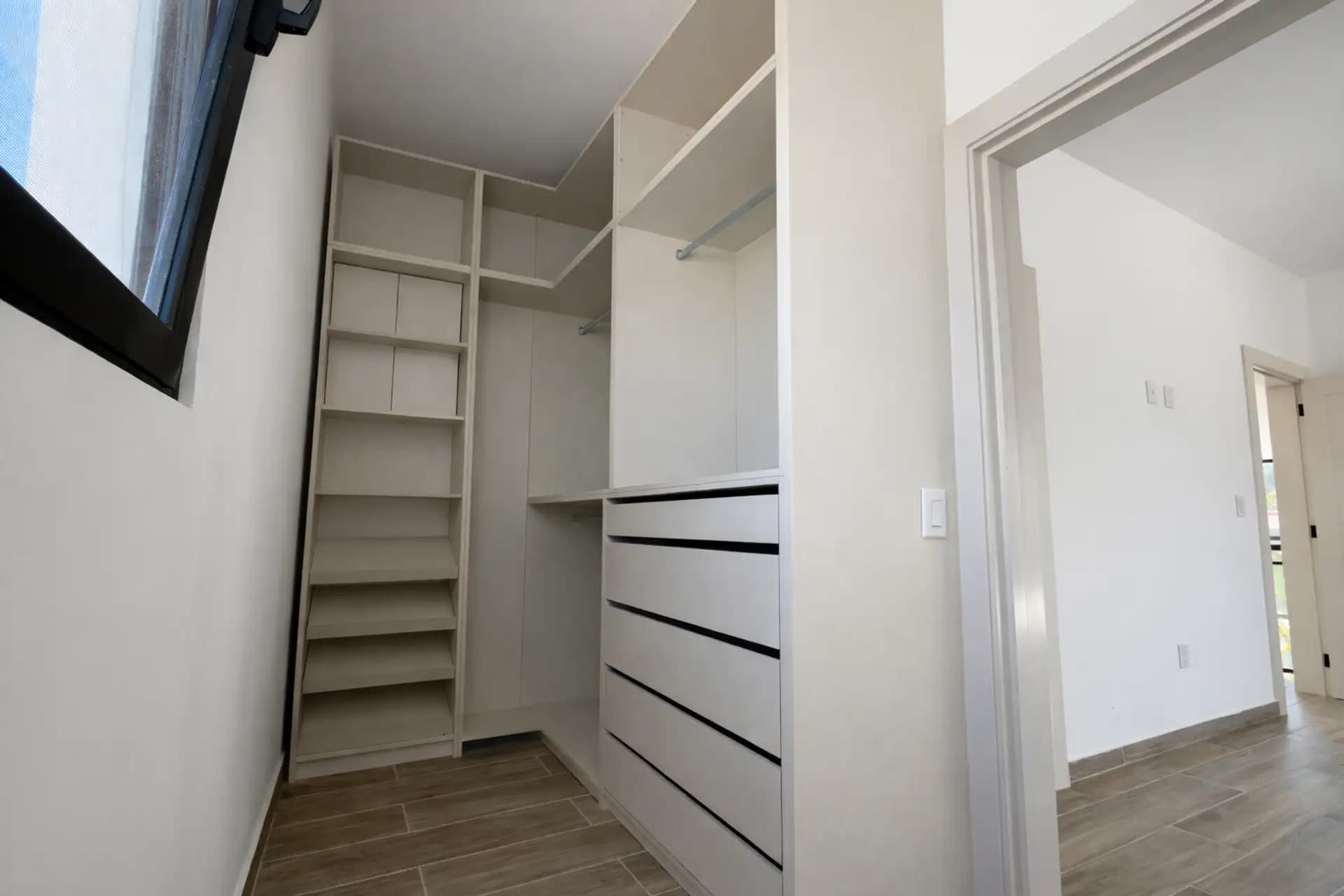 3-Bedroom New Pool Villa with Rooftop Terrace in Perla Marina — Walk-in closet