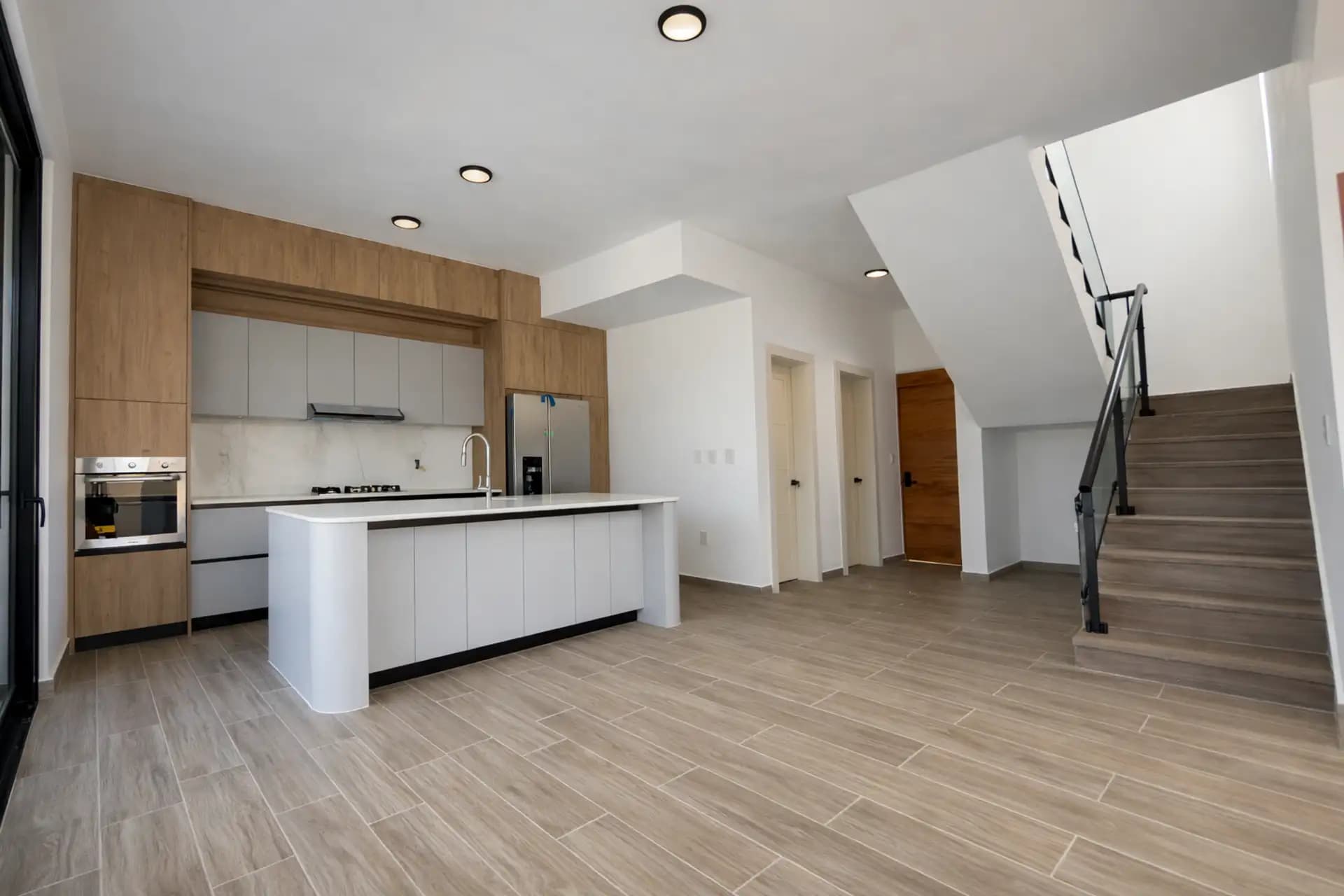 3-Bedroom New Pool Villa with Rooftop Terrace in Perla Marina — Open living & dining area